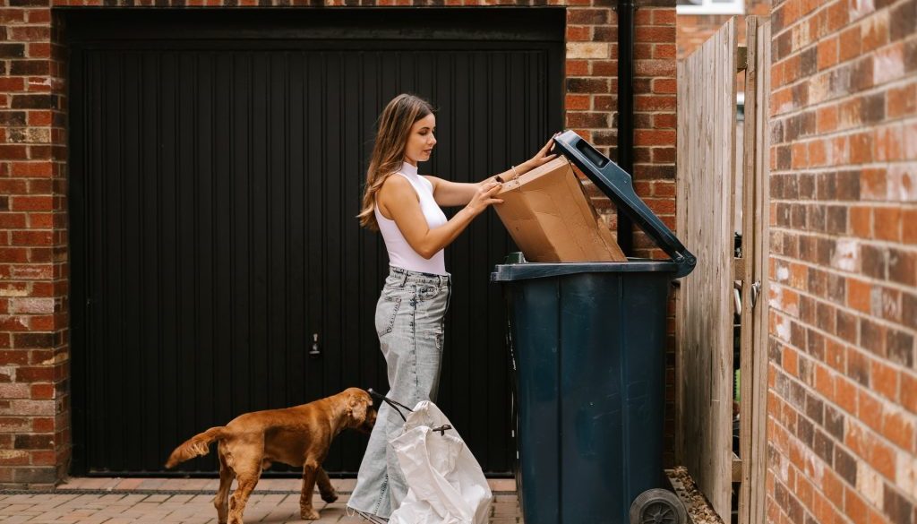 woman using skip bin